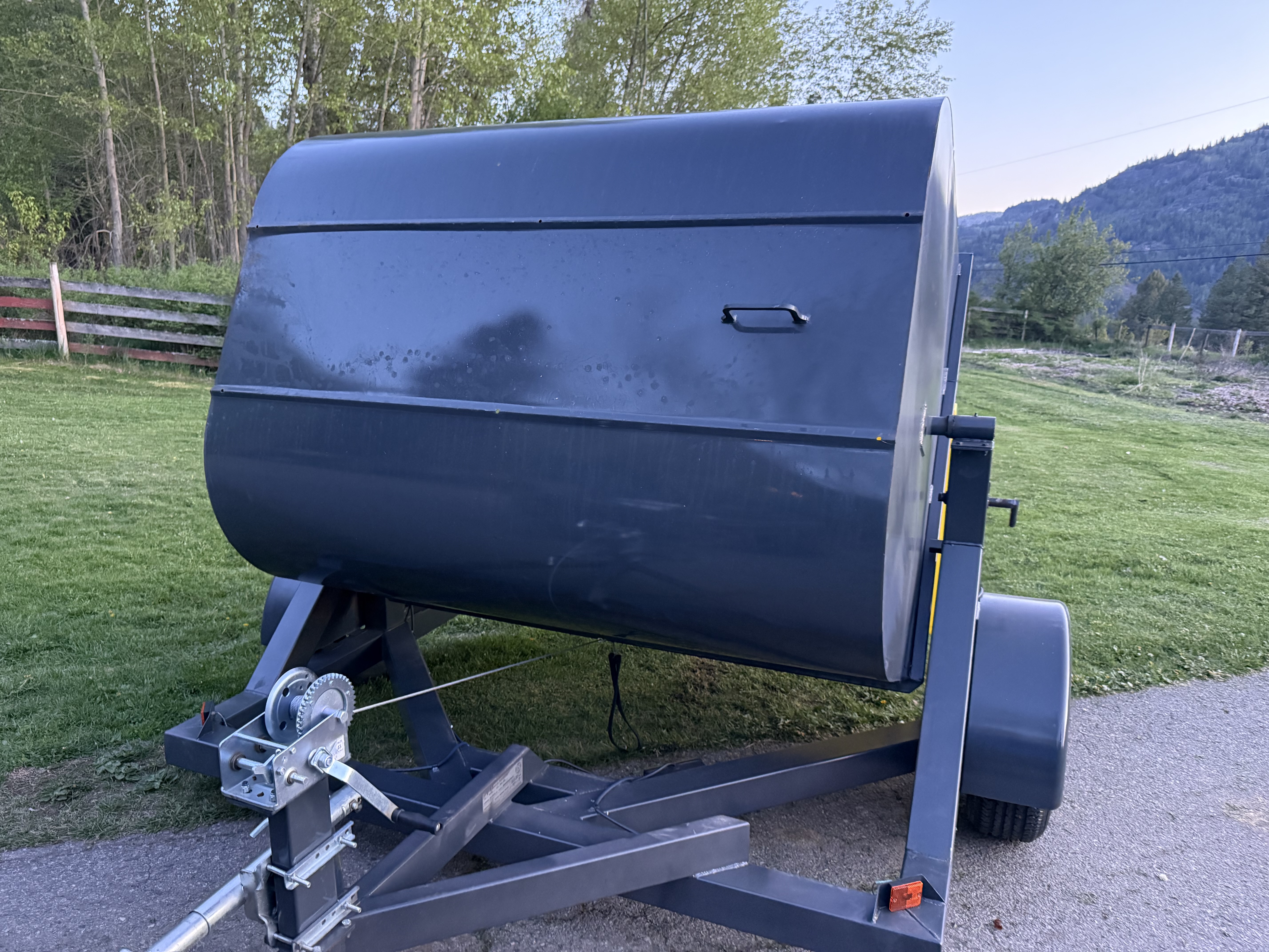 Kootenay Bins — trailer bin in spring Kootenay setting